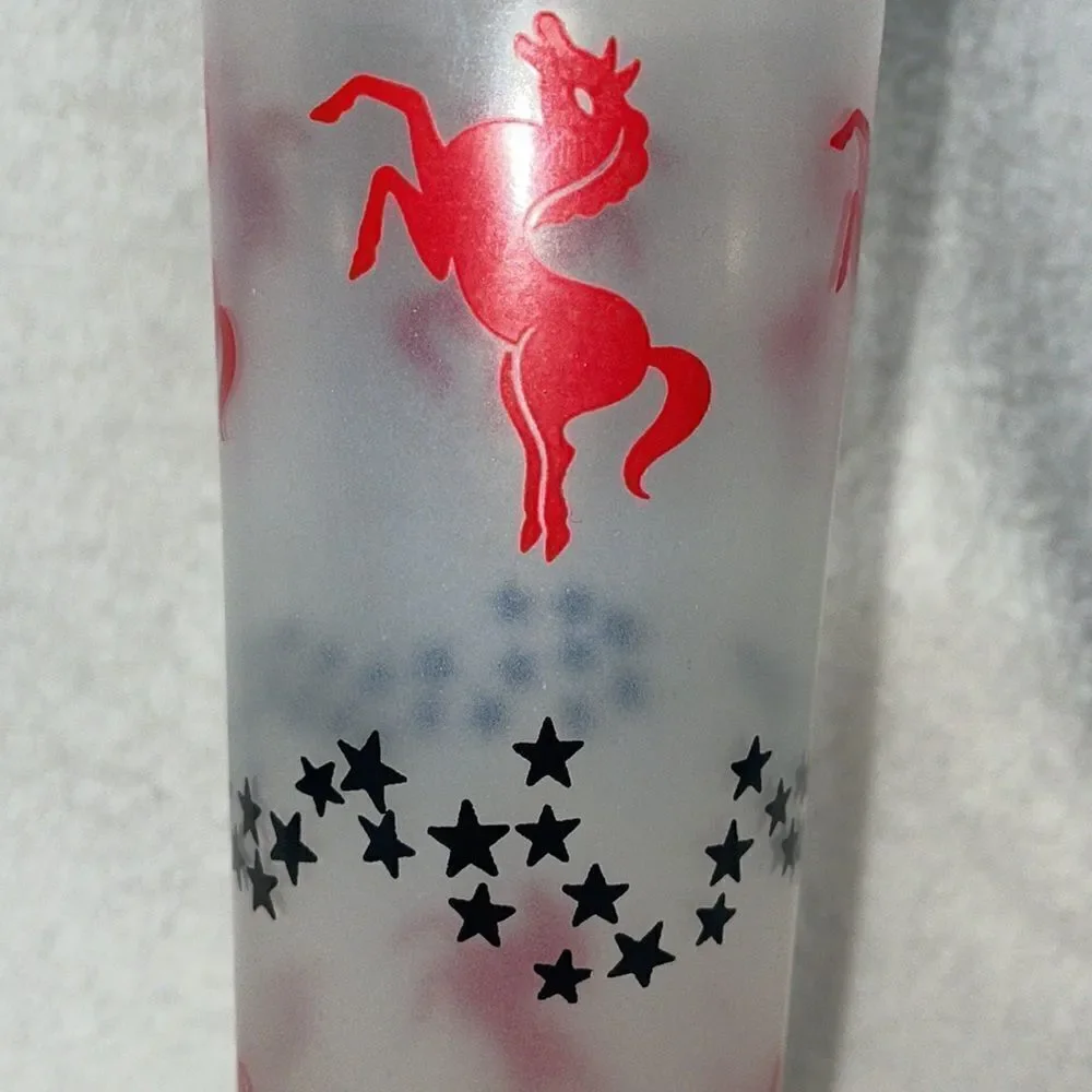 Tall drinking glass